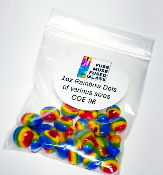 One-ounce bag of rainbow glass dots labeled “Fuse Muse Fused Glass – COE 96” showing assorted sizes.